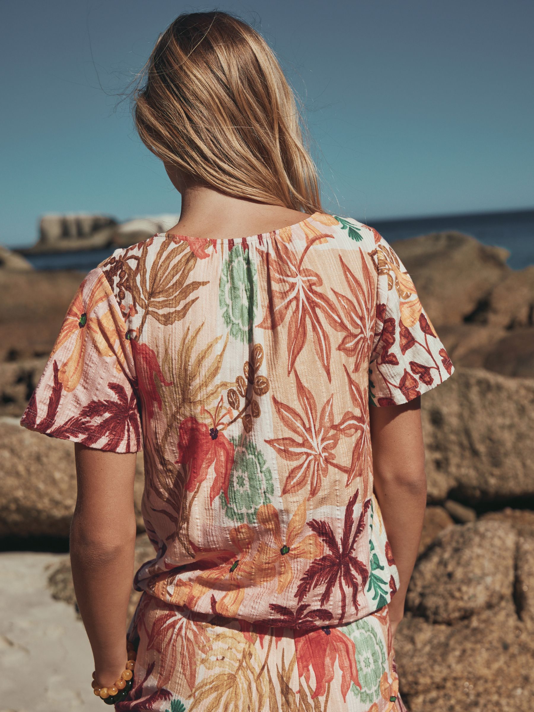 Buy Pink Palm Print Short Sleeve Notch Neck Shirred Bubblehem Top