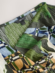 Green Geo Print Asymmetric Pleated Drape Short Sleeve Top - Image 6 of 7