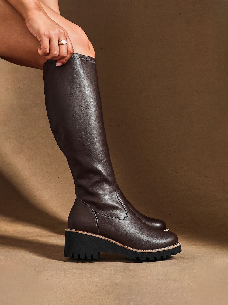 Linzi Light Brown Wide Fit Maintain Stretch High Leg Wedge Boots - Image 1 of 6 Linzi Light Brown Wide Fit Maintain Stretch High Leg Wedge Boots - Image 1 of 6