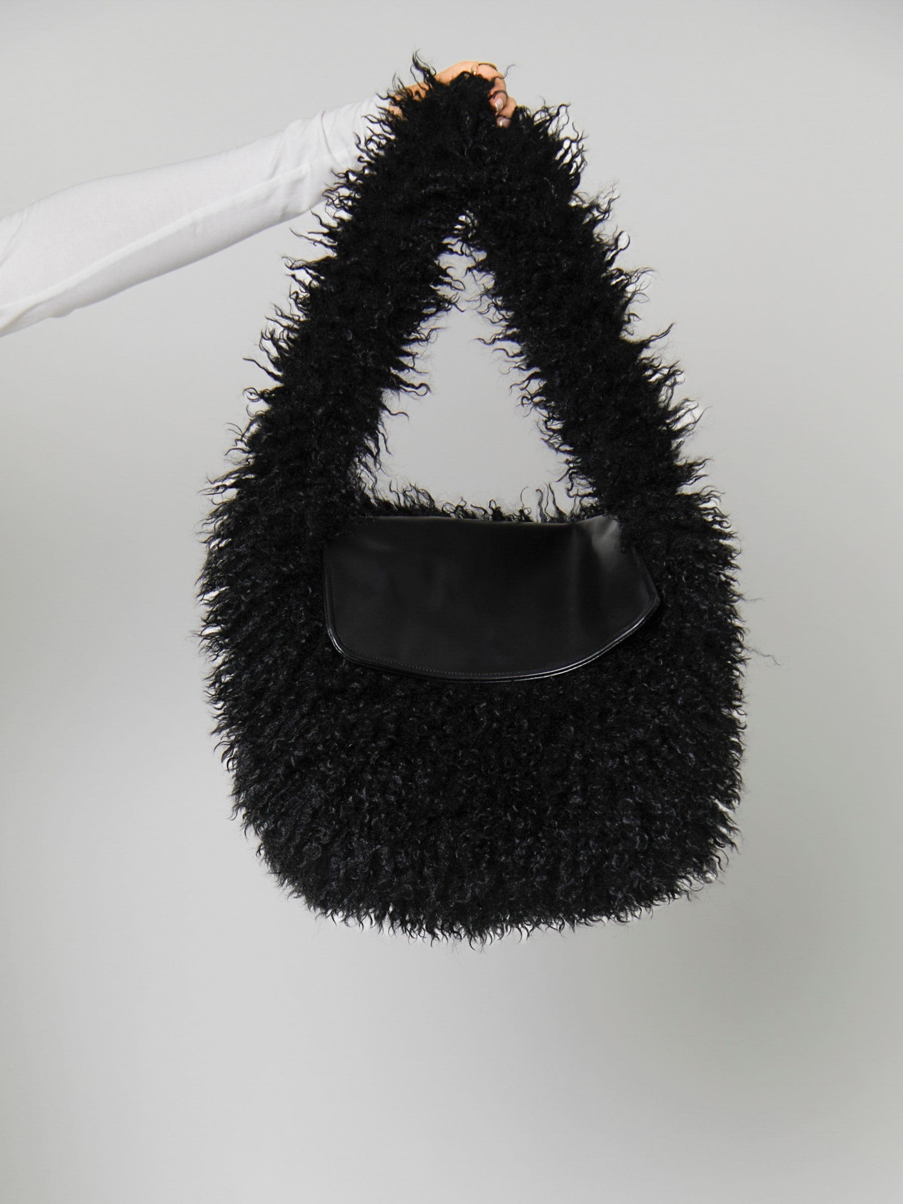 Buy South Beach Black Faux Fur Shoulder Bag from the Next UK
