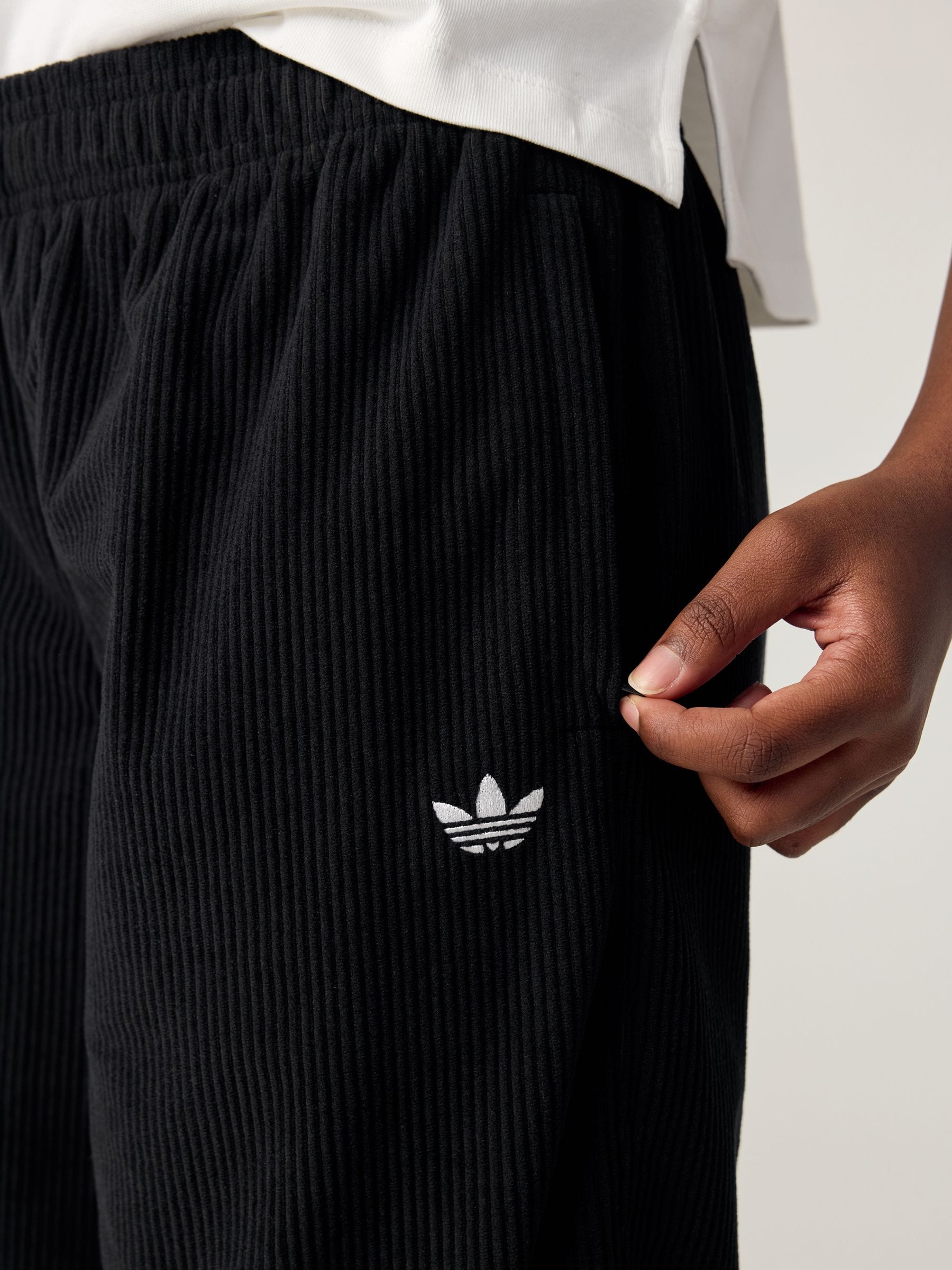 Buy adidas Originals Black Oversized Corduroy Trousers from Next