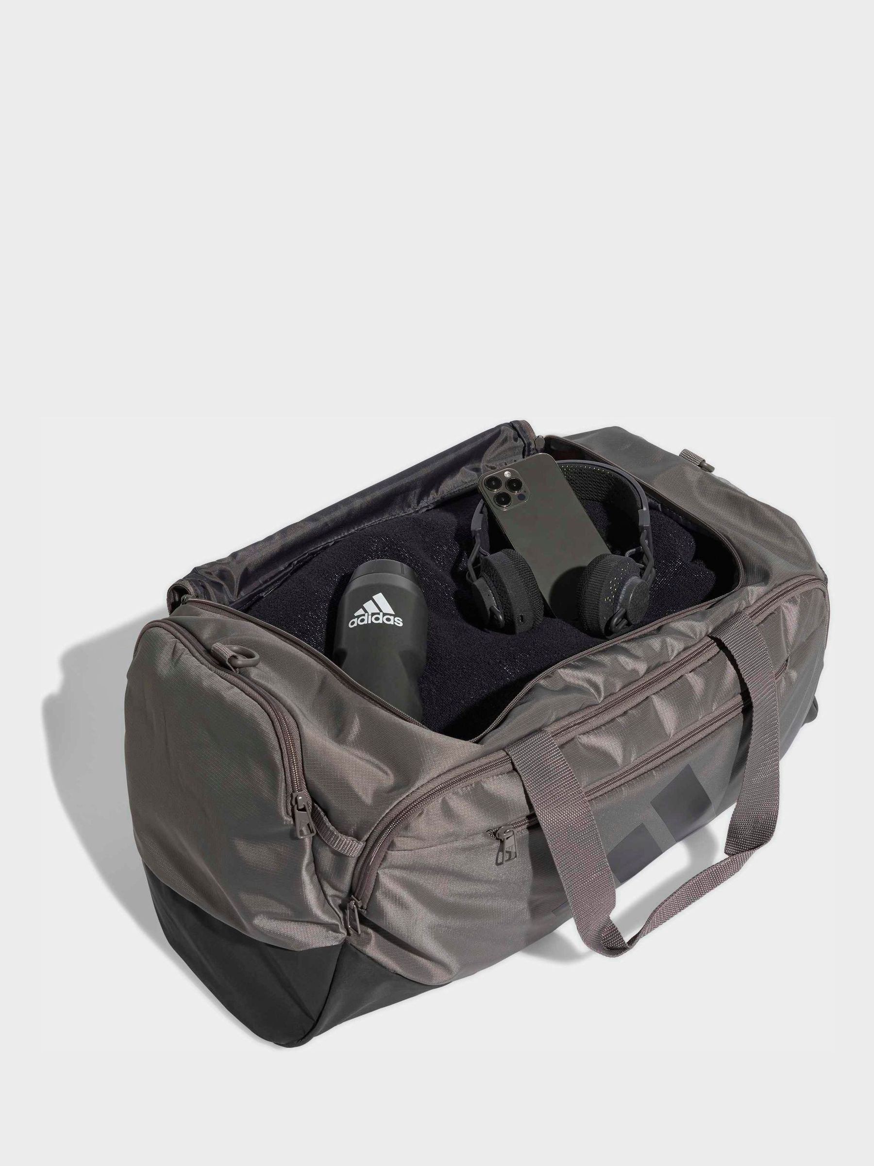 Buy Коричневий - adidas Training Defender Medium Duffle Bag з