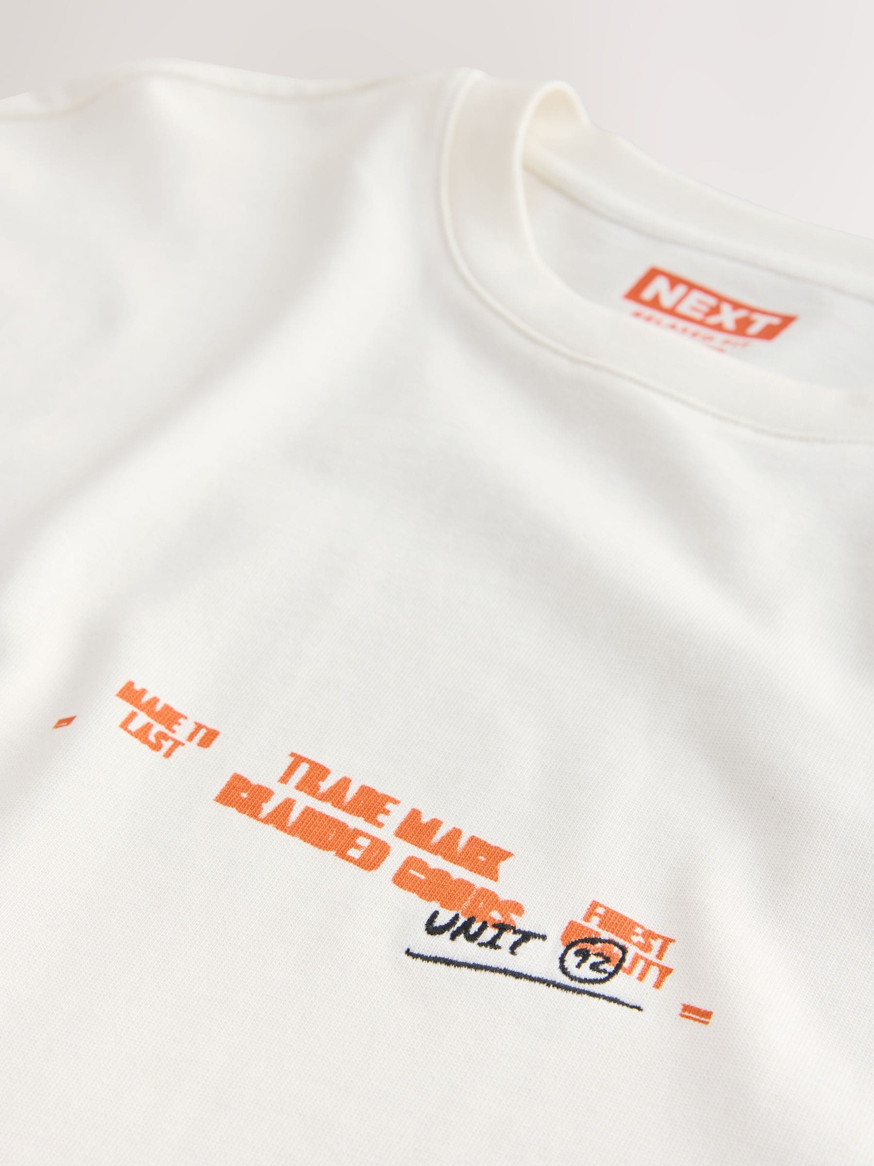 Buy White text Relaxed Fit Graphic Print Heavy Weight T-Shirt from