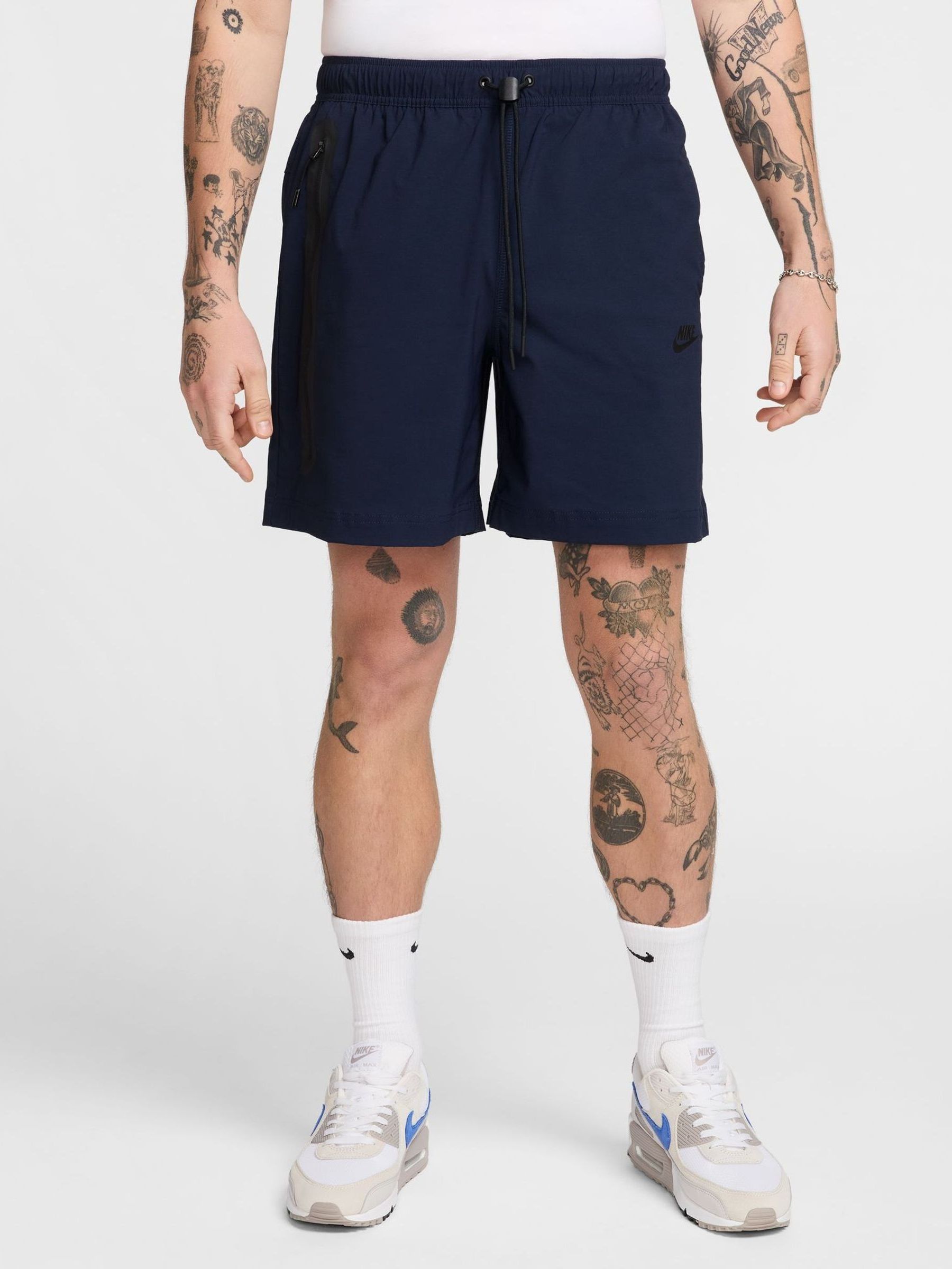 nike woven shorts light blue