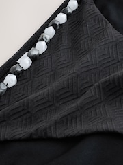 Never Fully Dressed Beaded Tie Side Bikini Bottoms - תמונה 3 מתוך 3