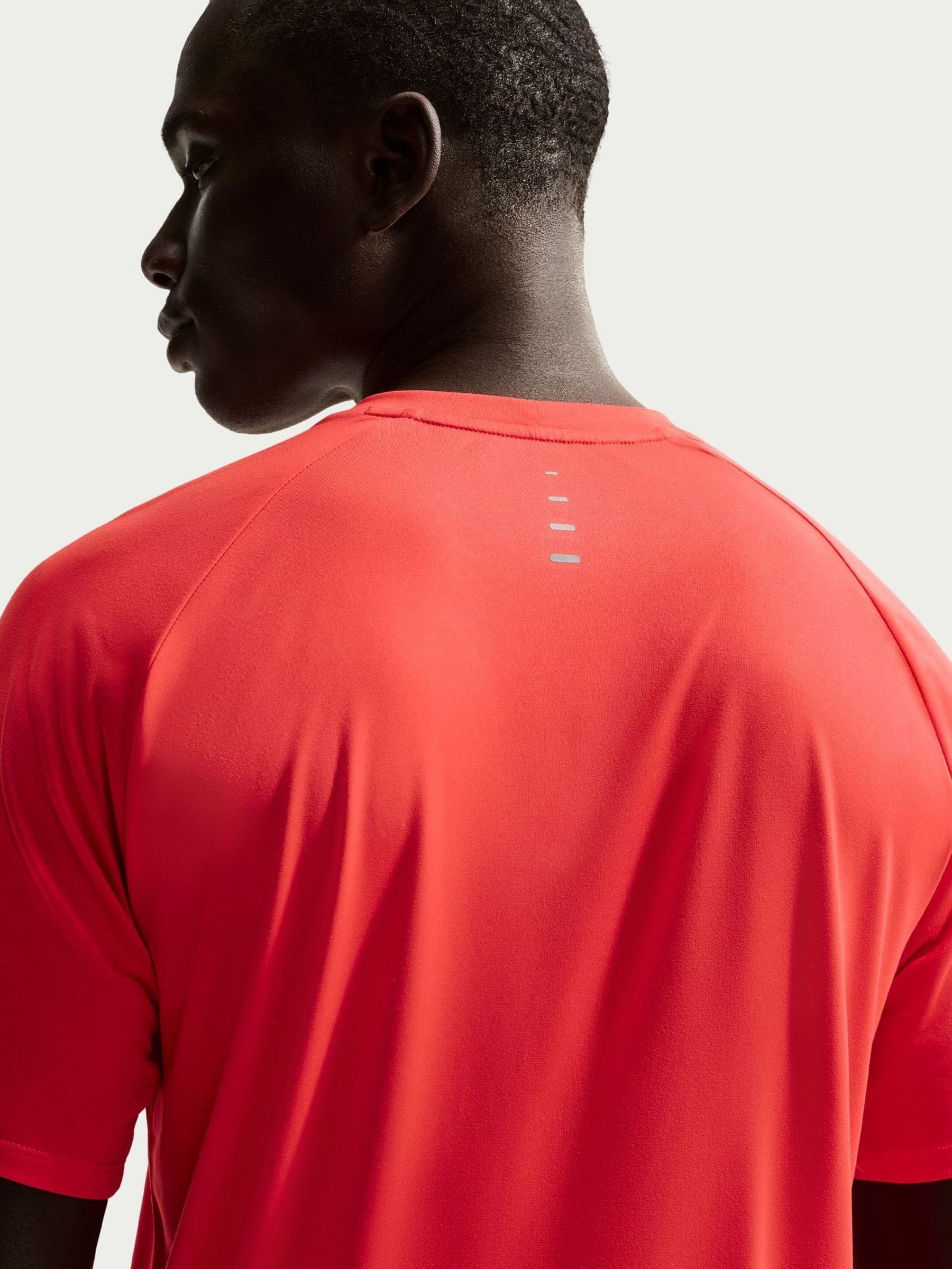 crimson orange nike shirt