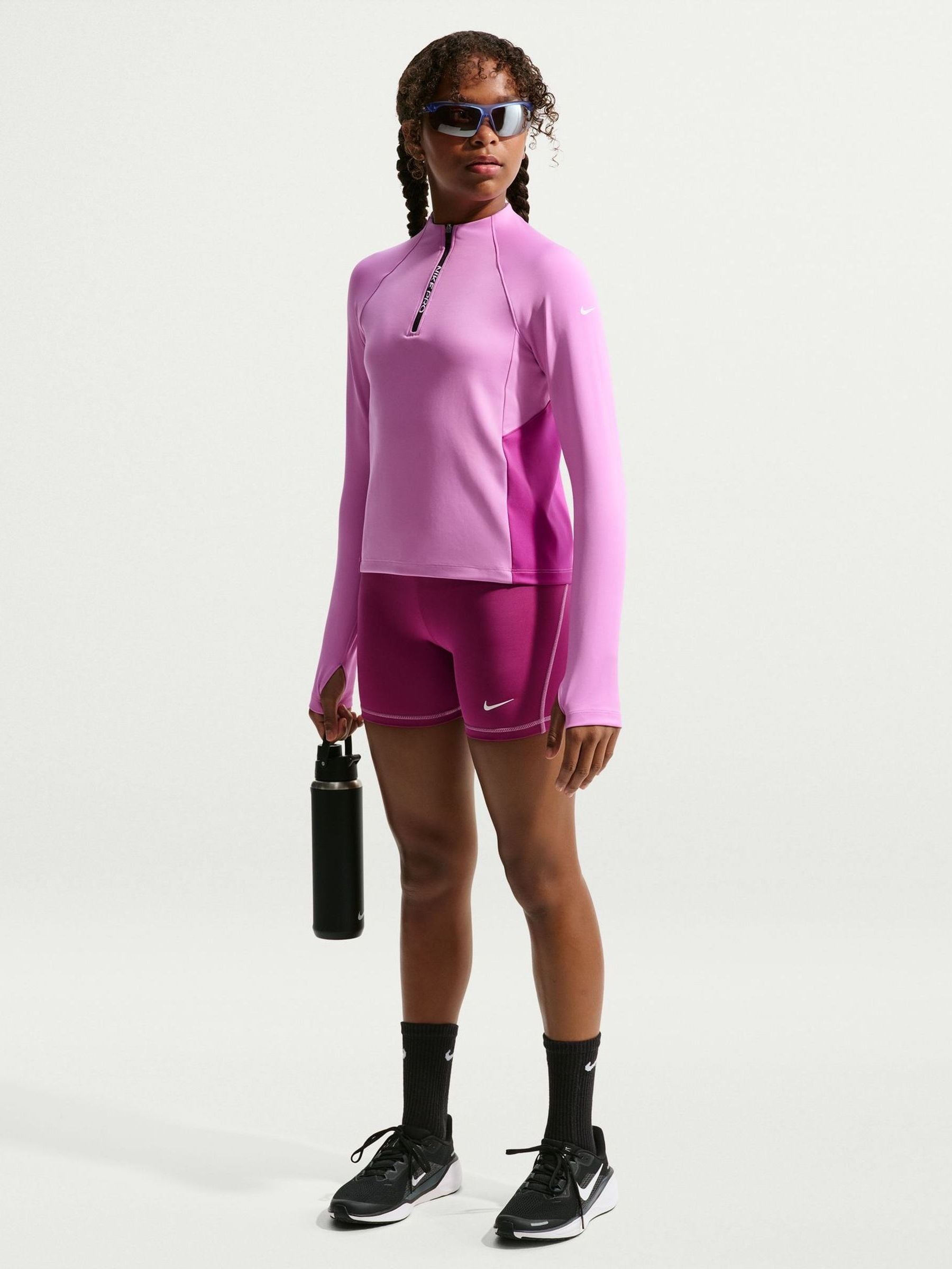 nike pink half zip top