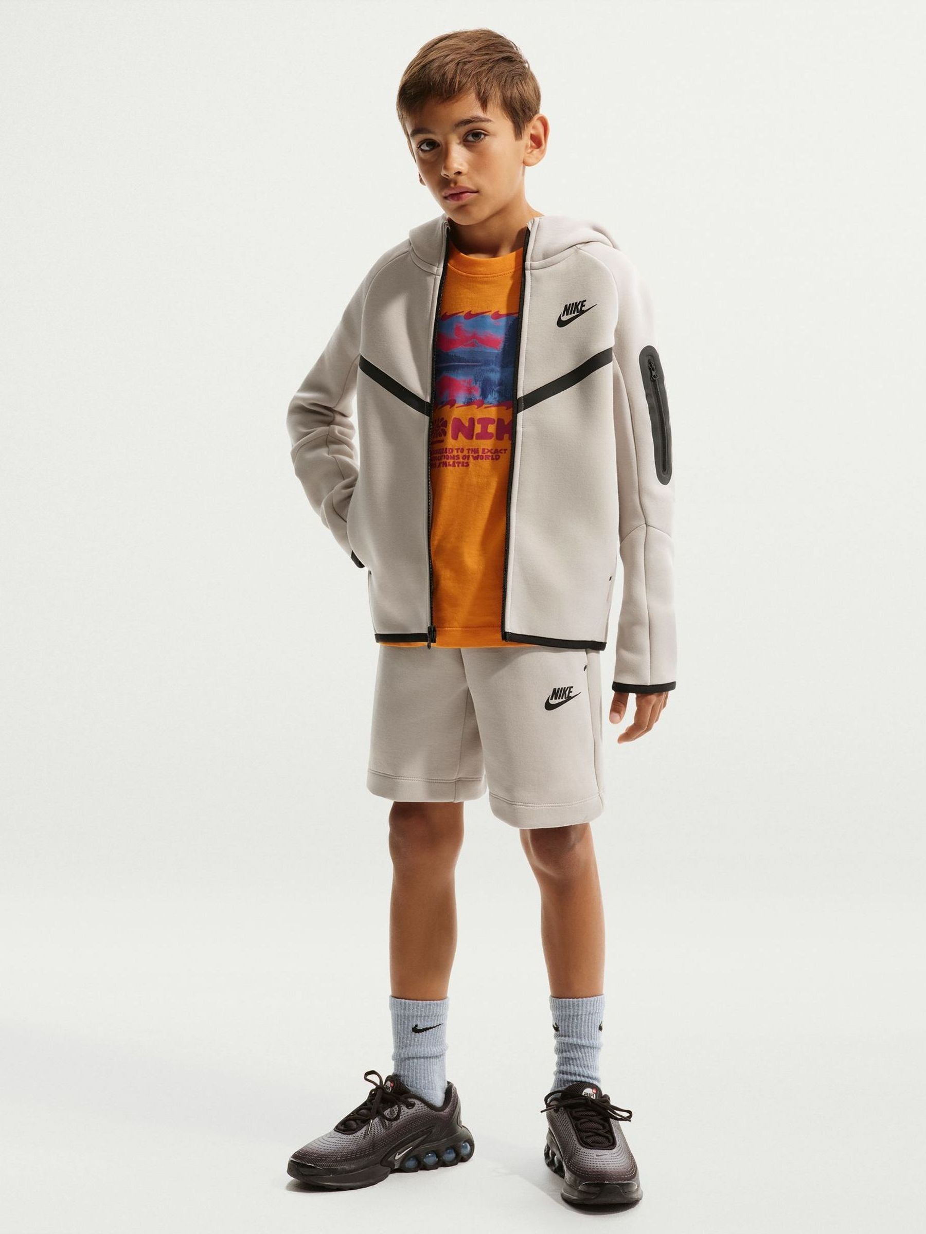 grey and orange nike tech fleece