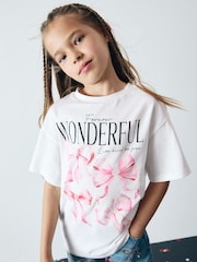 White Oversized Bow Graphic 100% Cotton T-Shirt (3-16yrs) - Image 1 of 5