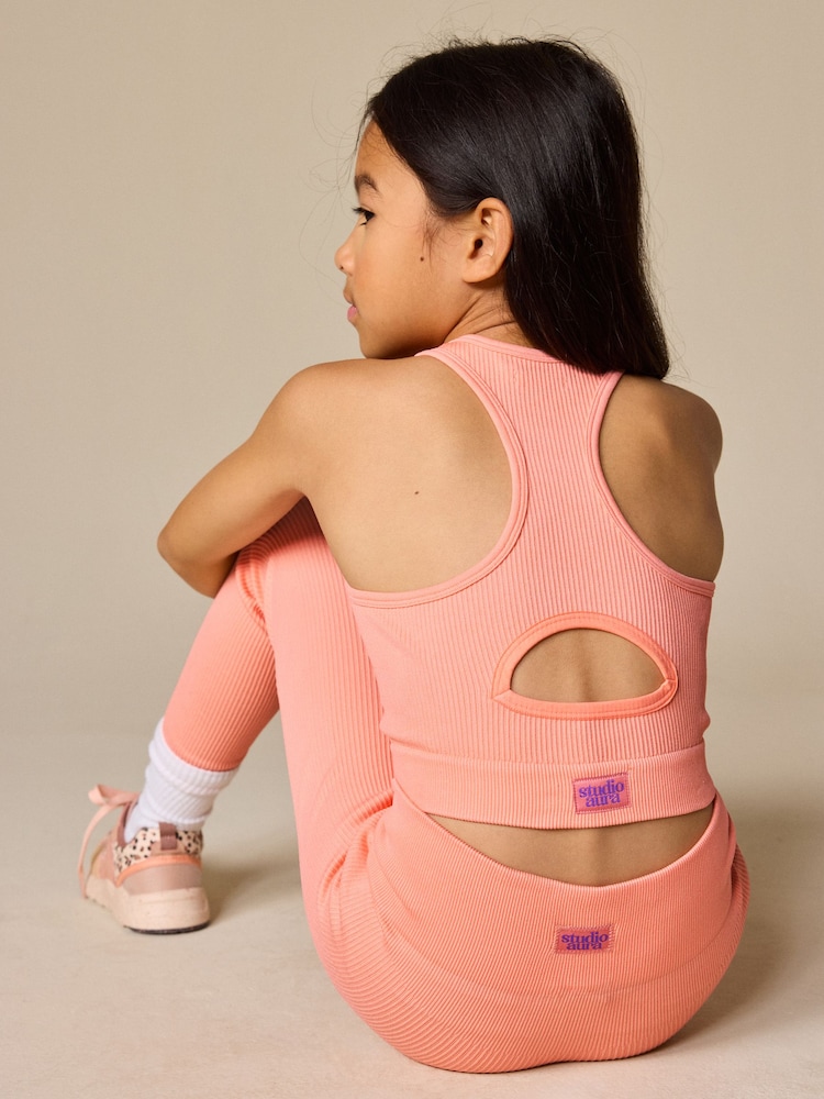 برتقالي مرجاني - رداء علوي رياضي قصير (5-16سنة) - صورة 2 من 7