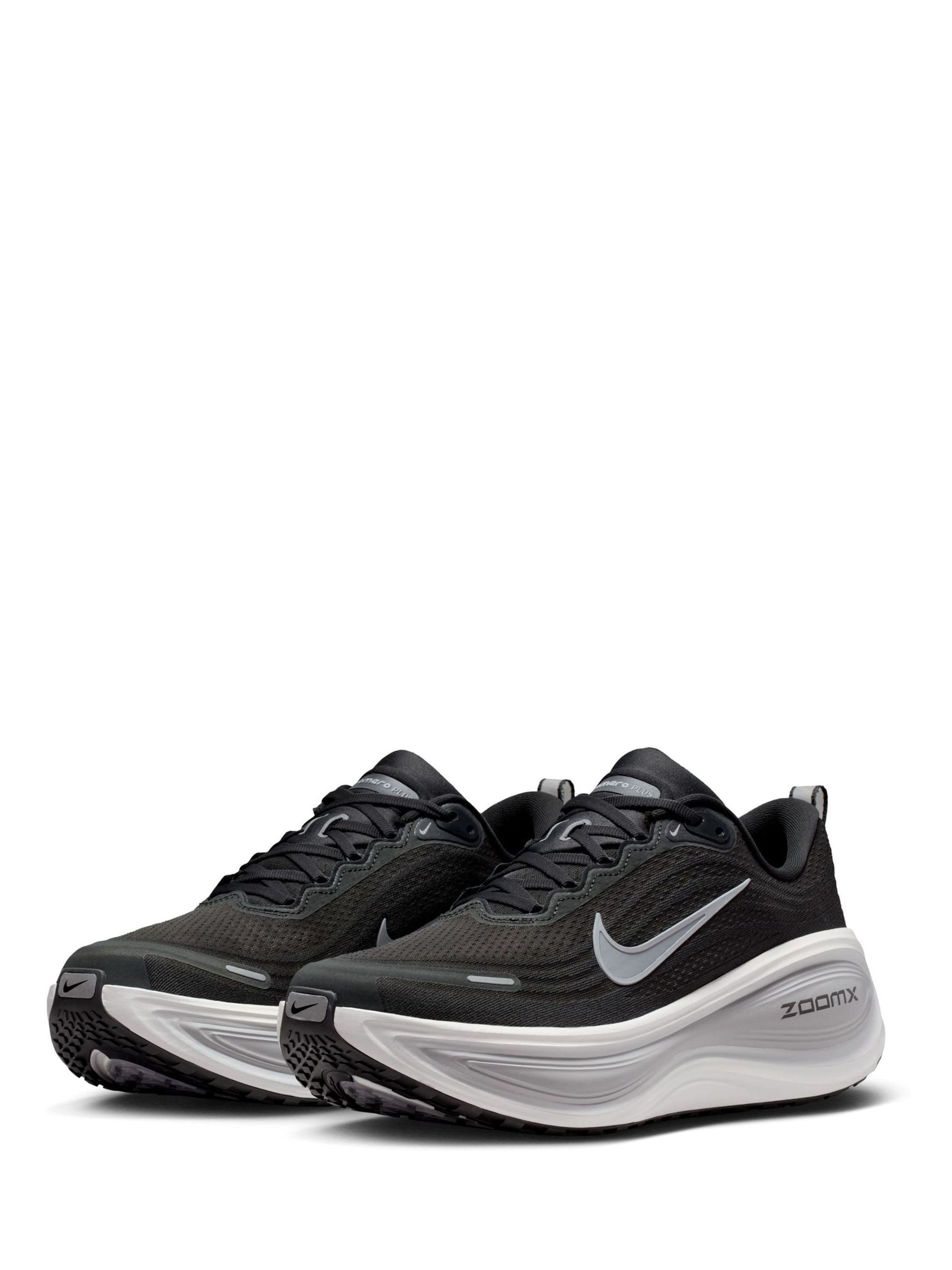 Comprar Cinza/Branco - Tênis de corrida Nike Vomero Plus from Next