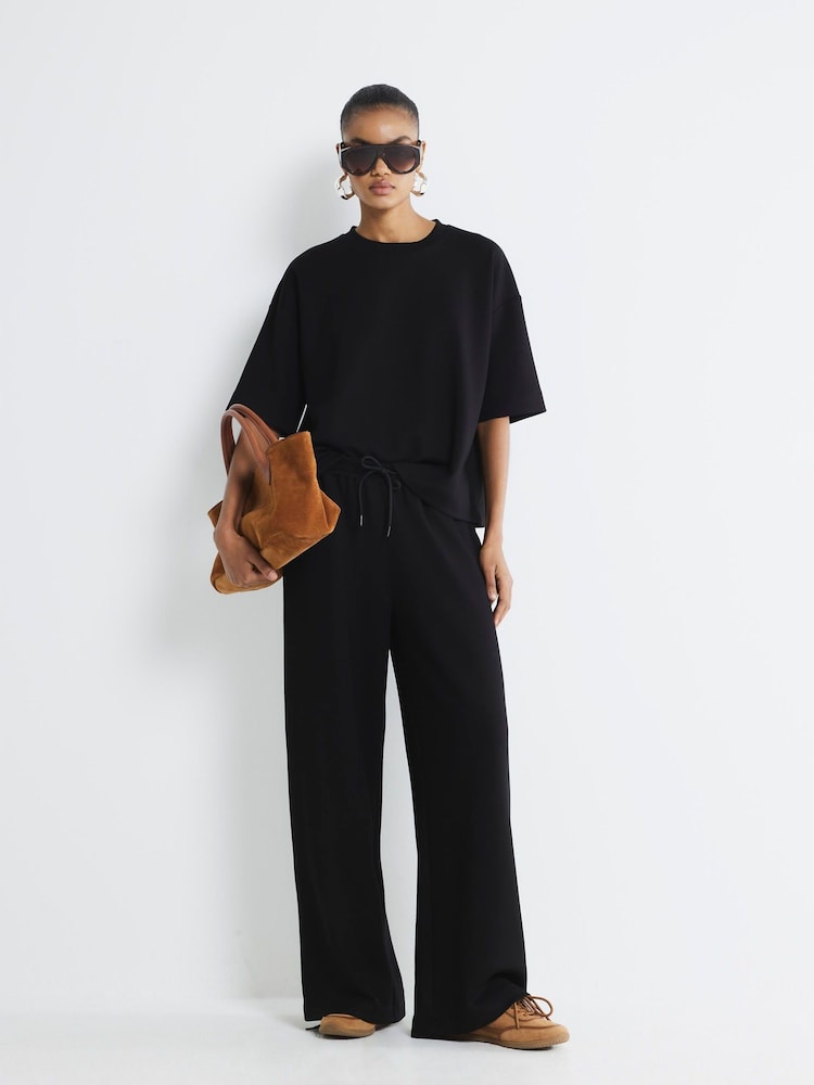 River Island Black Premium High Waisted Wide Leg Joggers - Image 1 of 6