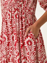 Vestido midi com estampa abstrata romana e decote em V - Imagem 5 de 5