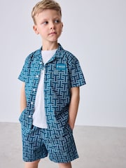 طقم تيشرت وشورت بطبعة كاملة باللون الأزرق من Baker by Ted Baker - صورة 1 من 18