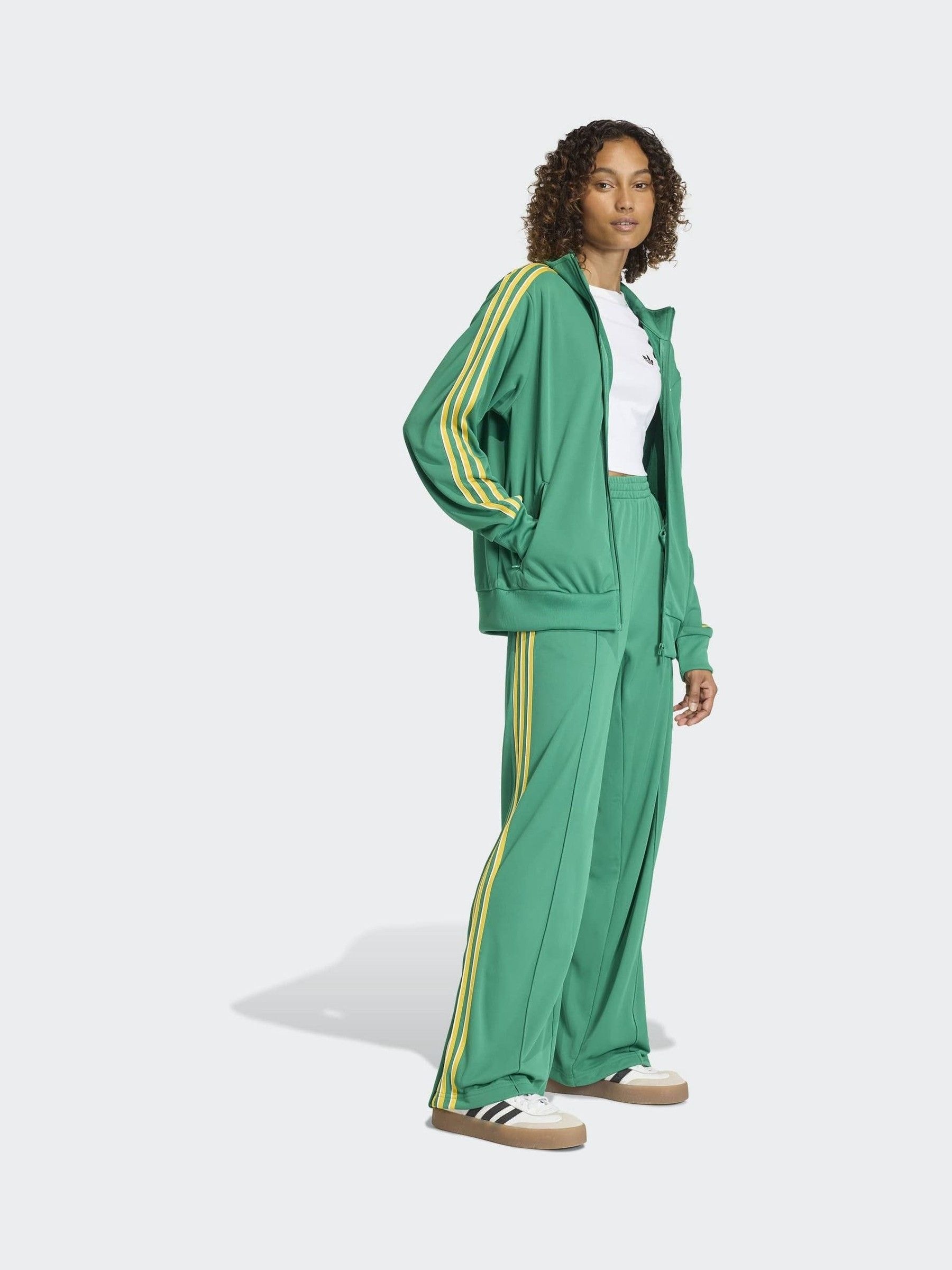 Buy adidas Originals Green Firebird Loose Track Joggers from the