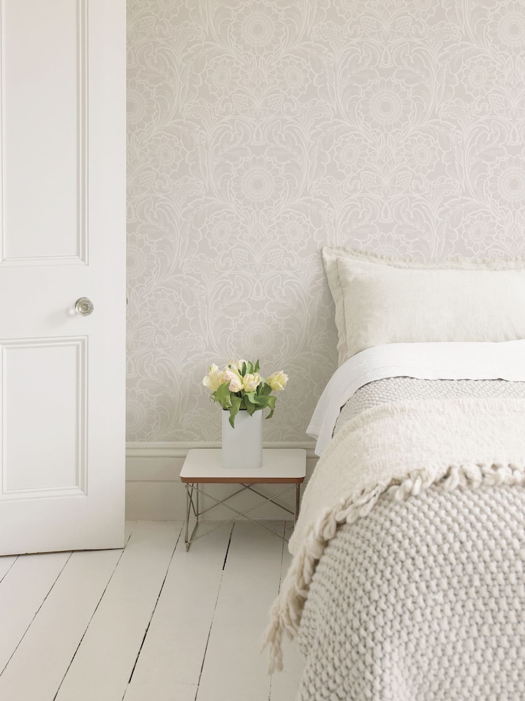 Laurence Llewelyn-Bowen Beige Sunnyside Up Floral Print A4 Wallpaper Sample - Image 1 of 4
