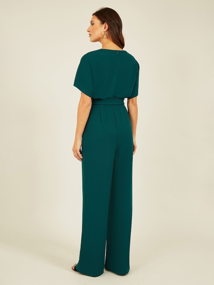 Buy Yumi Green Batwing Stretch Jumpsuit from the Next UK online shop - Main Image