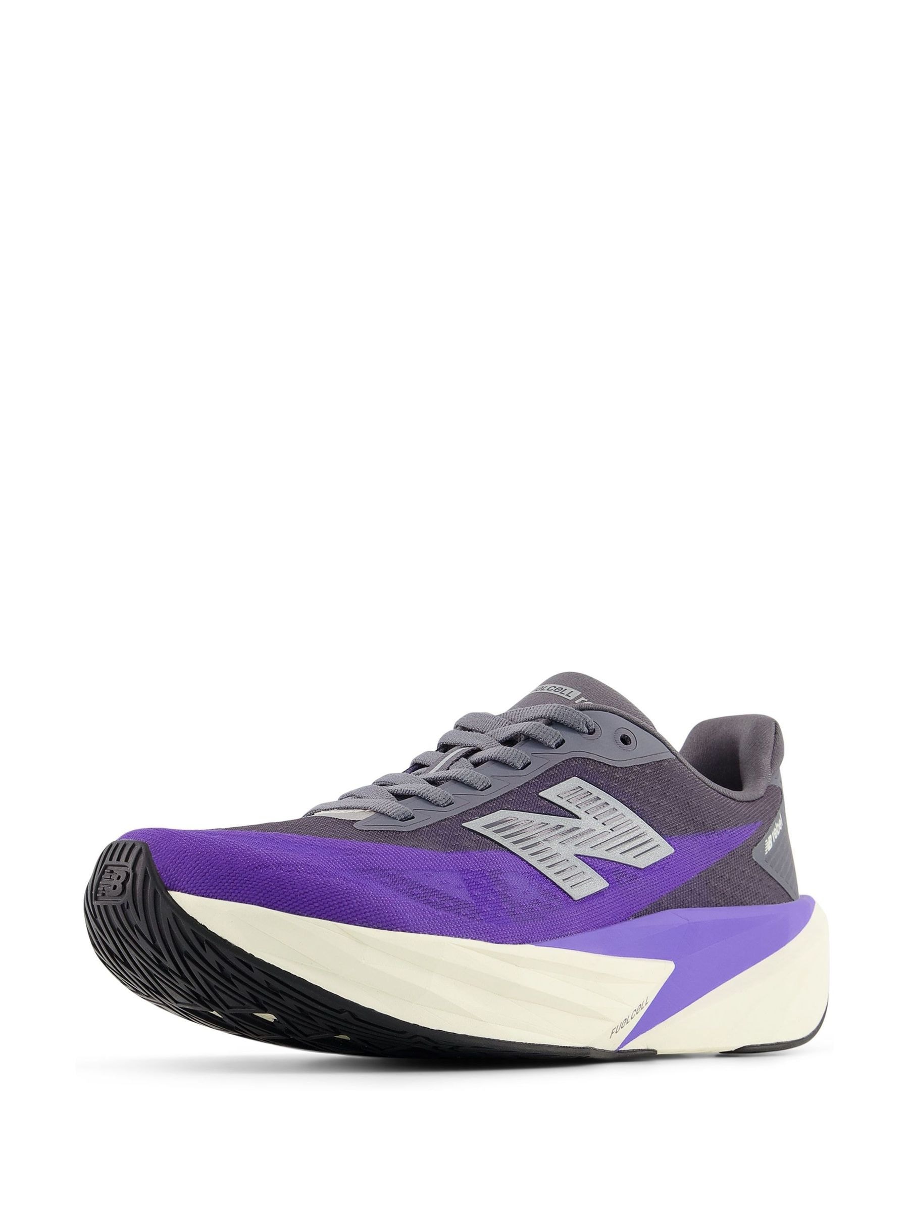 Buy New Balance Black/Purple Rebel v5 Running Trainers from Next USA