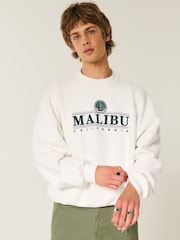Hollister Baggy Destination Graphic Print Cinched Bottom Cream Sweatshirt - Image 1 of 3