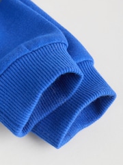 Azules brillantes - Conjunto de 6 piezas de suéter y pantalones deportivos para bebé (0 meses - 3 años) - Imagen 14 de 16