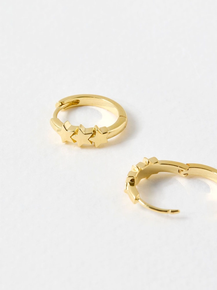 Oliver Bonas Gold Tone Tiny Triple Star Huggie Earrings - Image 3 of 3 Oliver Bonas Gold Tone Tiny Triple Star Huggie Earrings - Image 3 of 3
