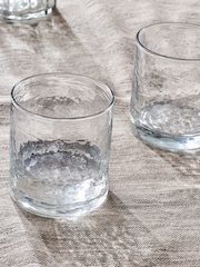 Nkuku Clear Yala Hammered Tumbler Glass - Image 1 of 2