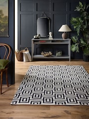 Origin Rug Collection. Black or White Labyrinth Rug - Image 1 of 5
