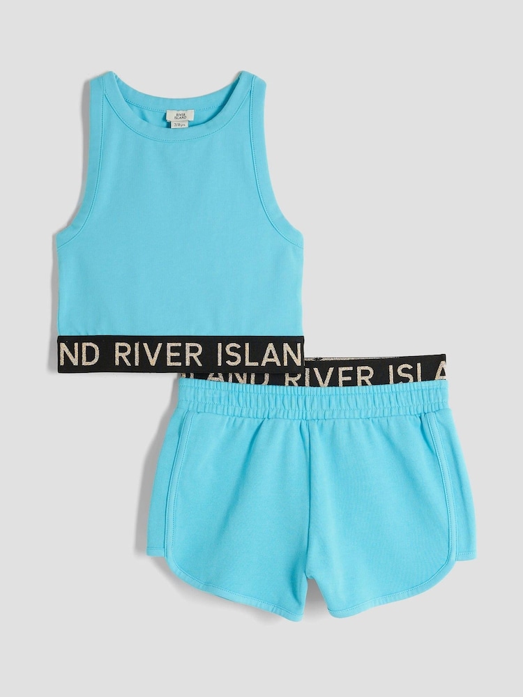 River Island Blue Girls Glitter RI Waistband Tank Top Set - Image 1 of 5 River Island Blue Girls Glitter RI Waistband Tank Top Set - Image 1 of 5