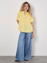 Apricot Yellow Smocking Tassel Tie Ruffle Top - Image 1 of 4