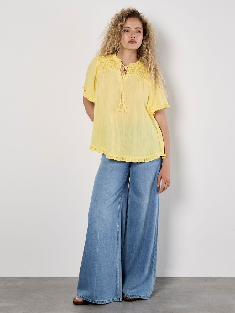 Apricot Yellow Smocking Tassel Tie Ruffle Top - Image 1 of 4