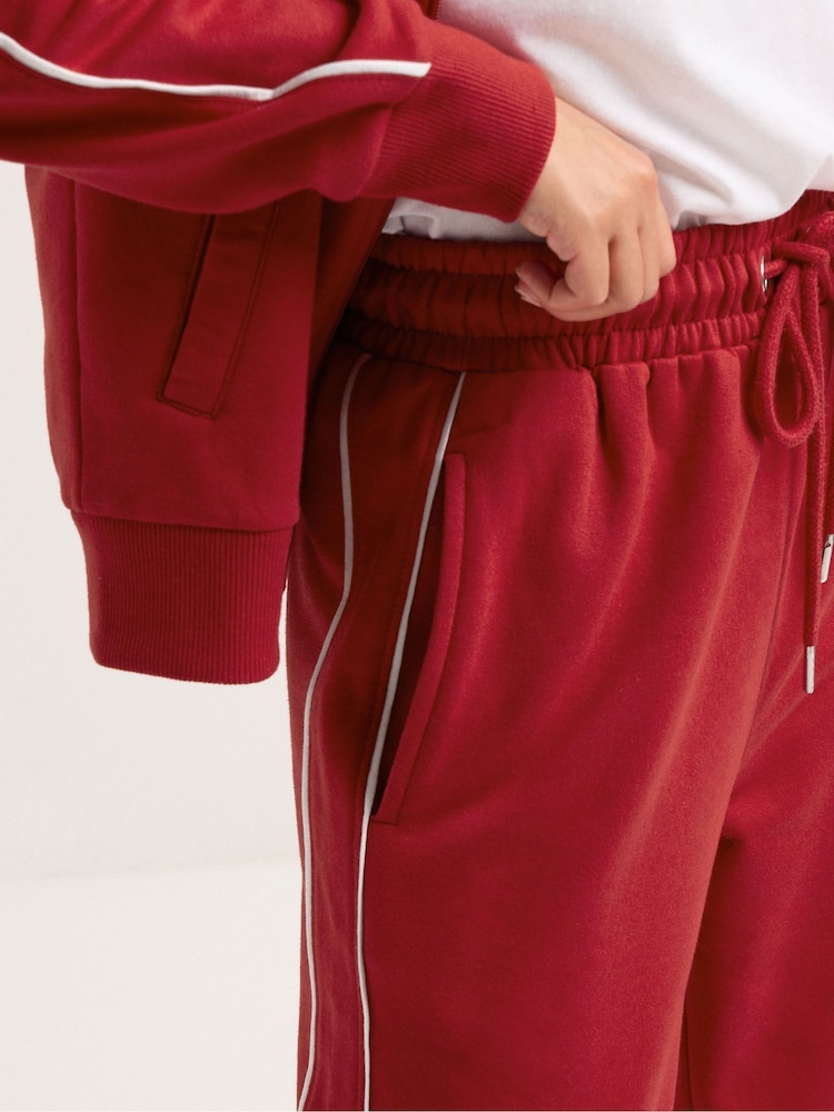 Buy PixieGirl Petite Red Contrast Piping Wide Leg Joggers from - Main Image