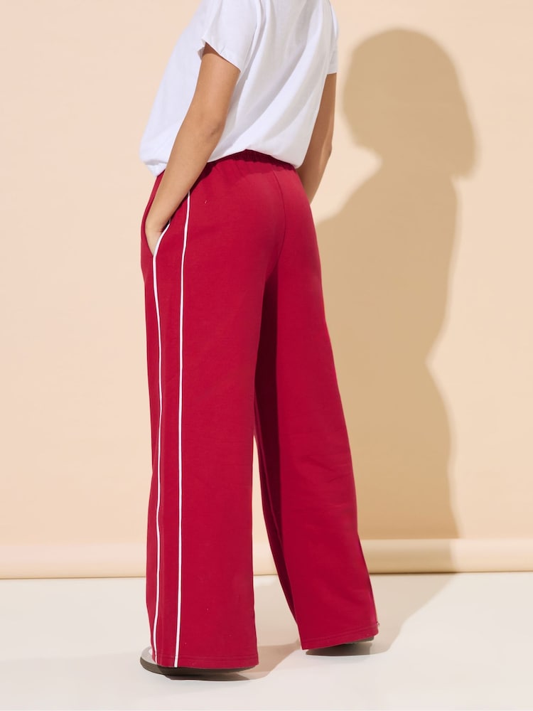Buy PixieGirl Petite Red Contrast Piping Wide Leg Joggers from the