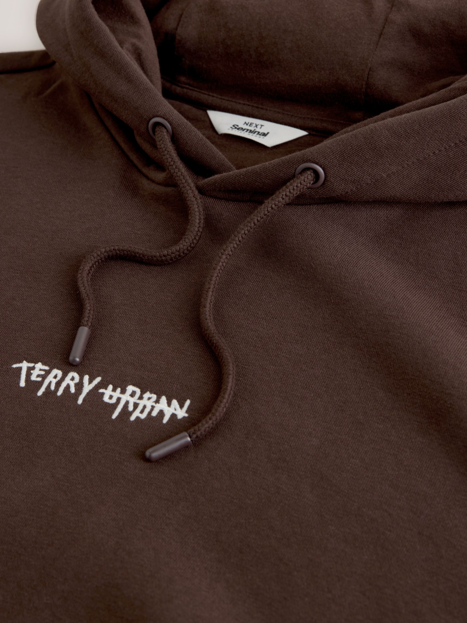 Buy Chocolate Brown Seminal Skull Graphic Hoodie from Next Switzerland