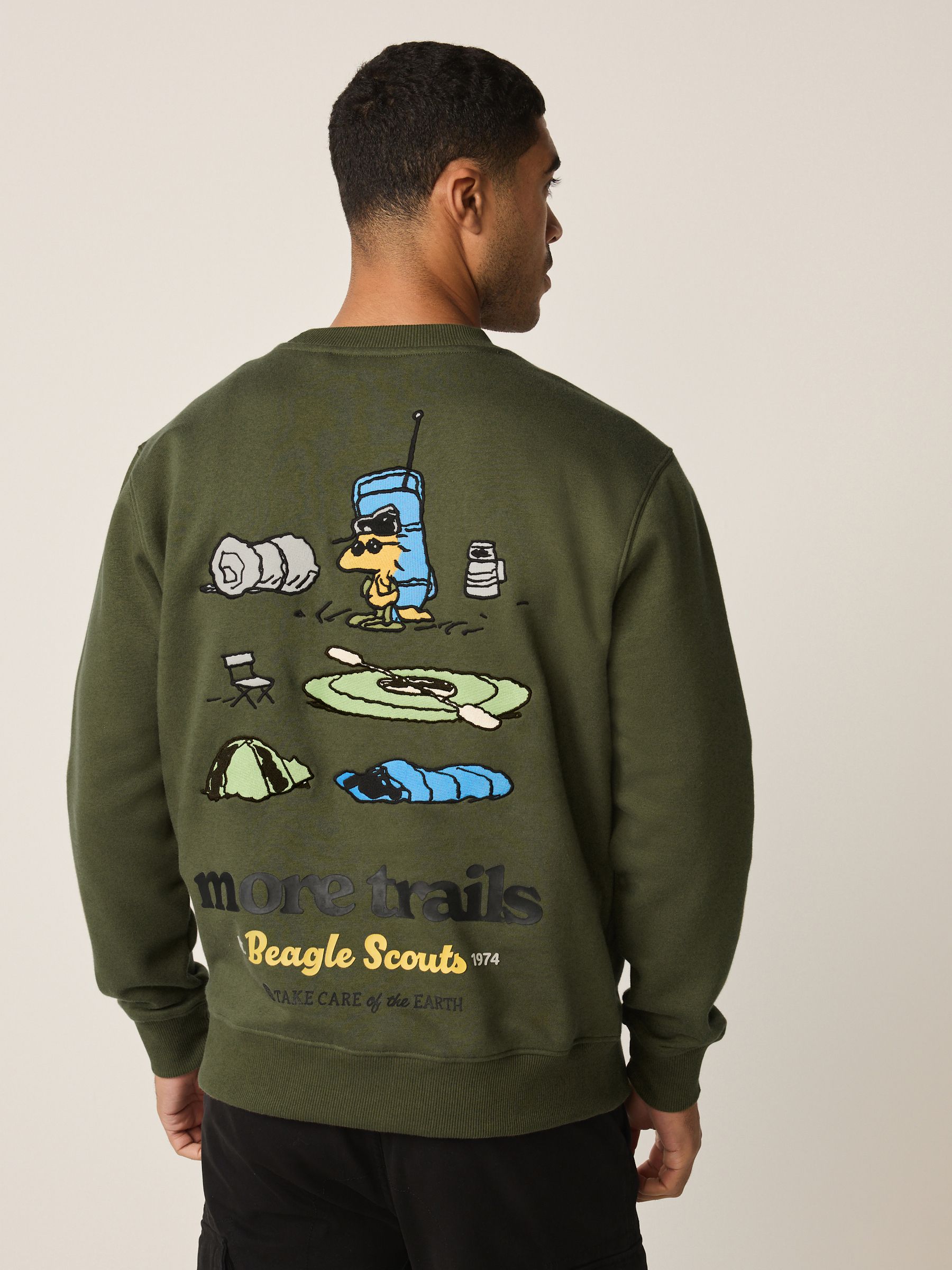 Buy Khaki Green Snoopy Licence Graphic Washed Crew Neck Sweatshirt