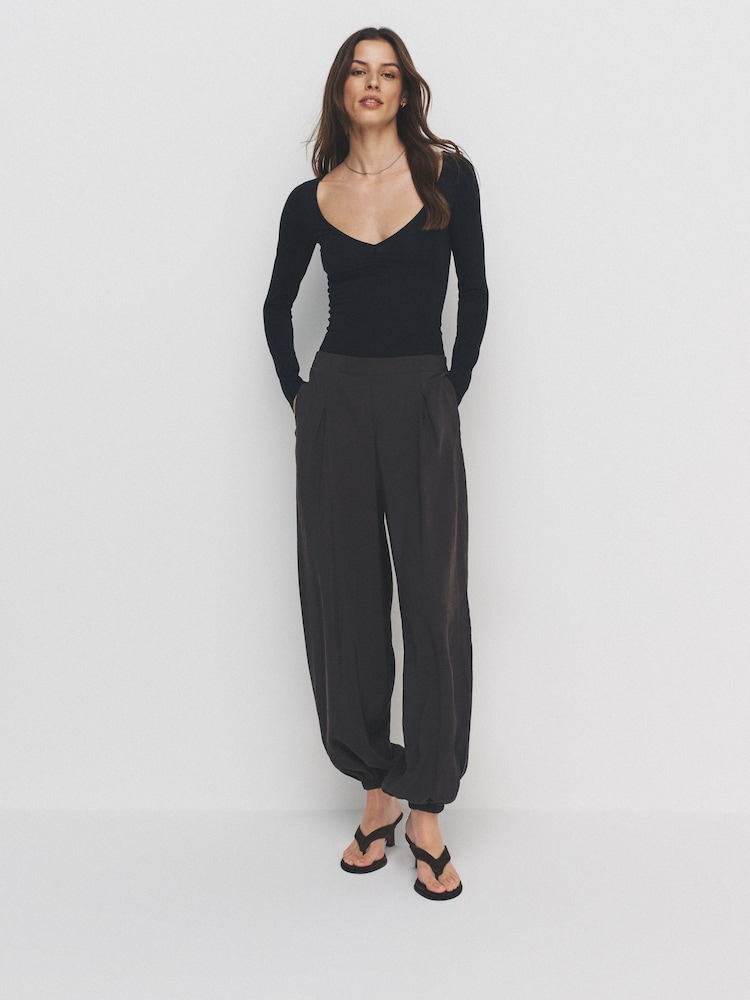 The Set 3 Pack Long Sleeve Ruched Front Bodysuit Black/Chocolate Brown/Cream - Image 1 of 4 The Set 3 Pack Long Sleeve Ruched Front Bodysuit Black/Chocolate Brown/Cream - Image 1 of 4