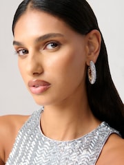 لون فضي - Aela Sparkle Thick Oval Hoop Earrings - صورة 1 من 3