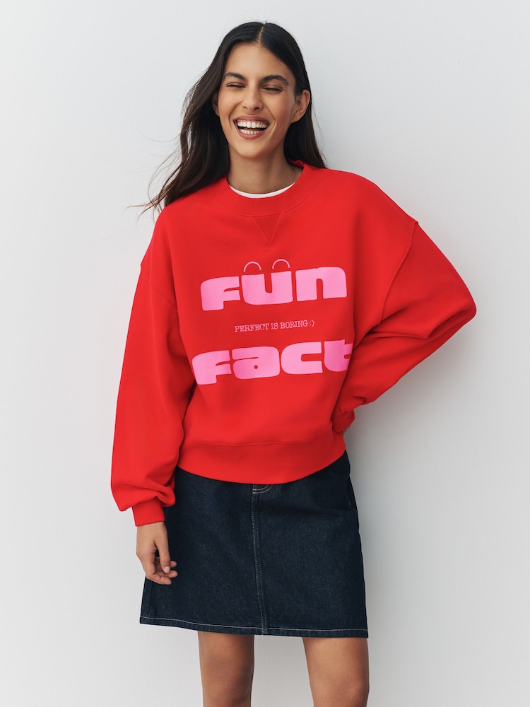 Red Graphics 'Fun Fact' Conversational Long Sleeve Crew Neck Sweatshirt - Image 1 of 7 Red Graphics 'Fun Fact' Conversational Long Sleeve Crew Neck Sweatshirt - Image 1 of 7