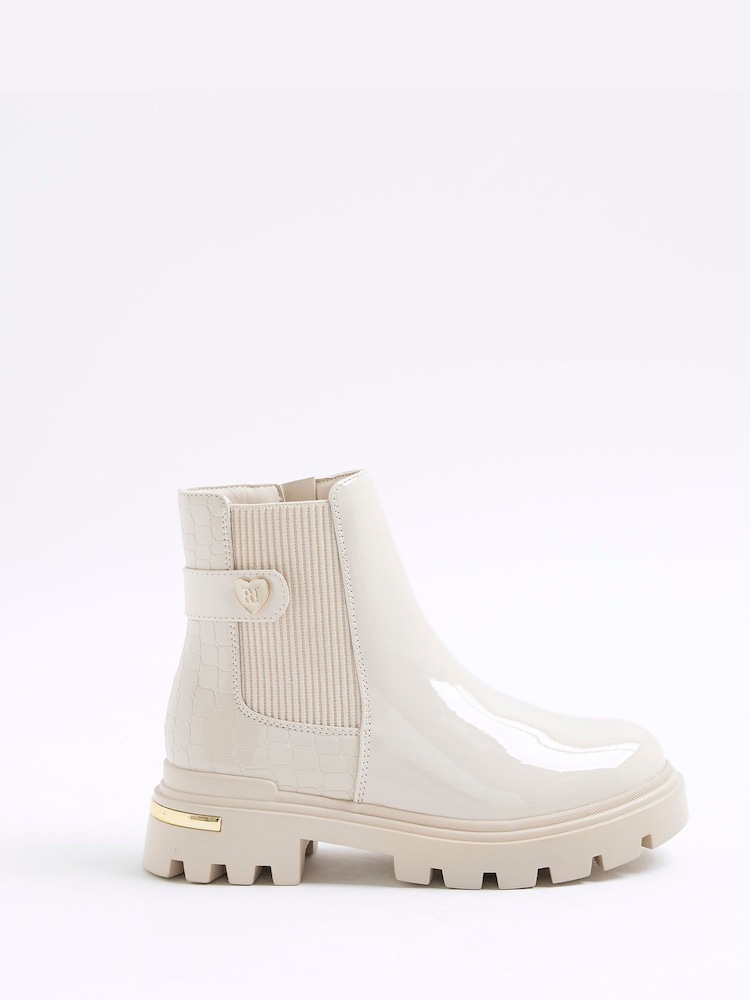 River Island Cream Girls Patent Heart Strap Chelsea Boots - Image 1 of 5 River Island Cream Girls Patent Heart Strap Chelsea Boots - Image 1 of 5