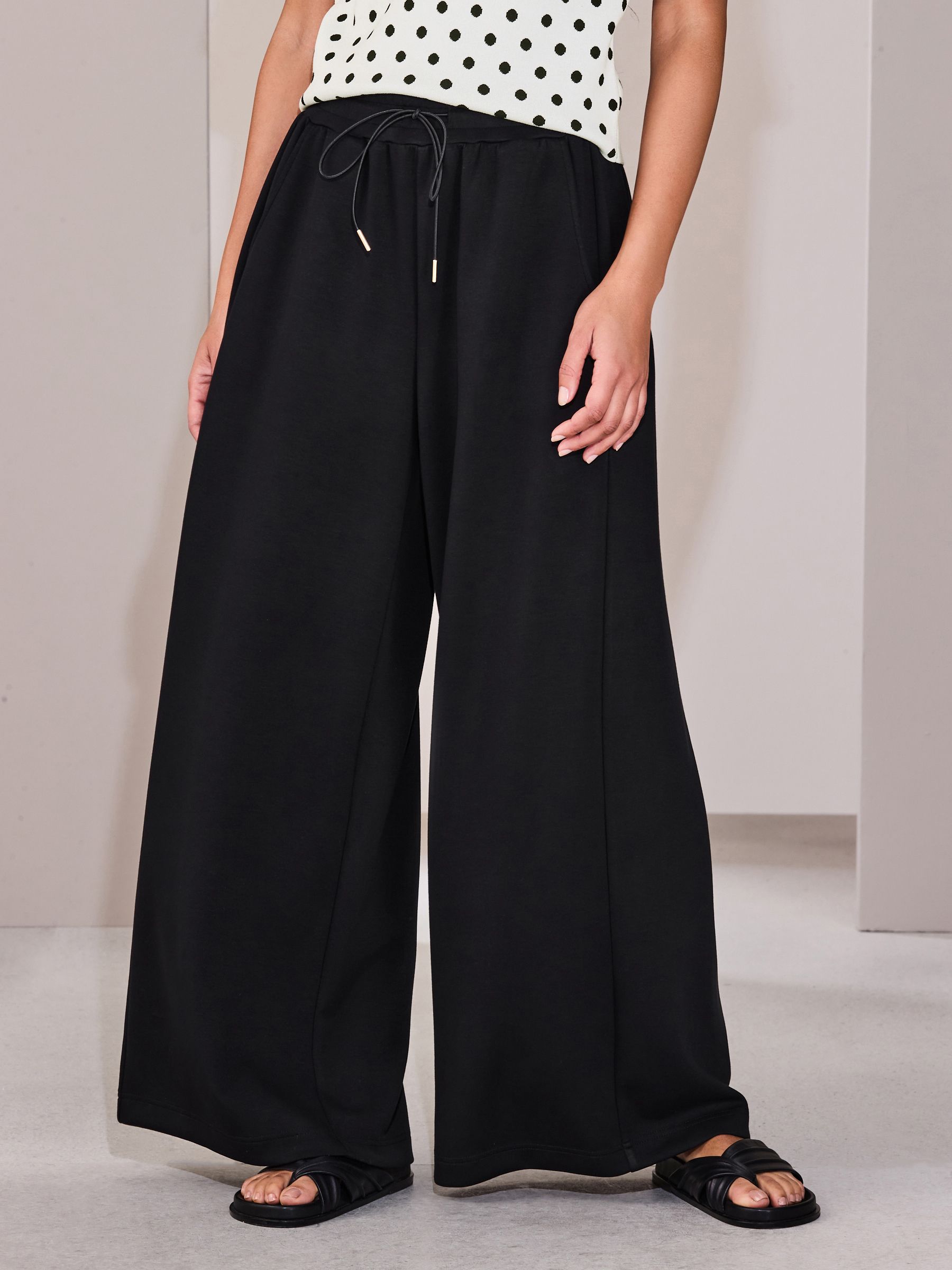 Buy Black Slinky Wide Leg Trousers from the Next UK online shop