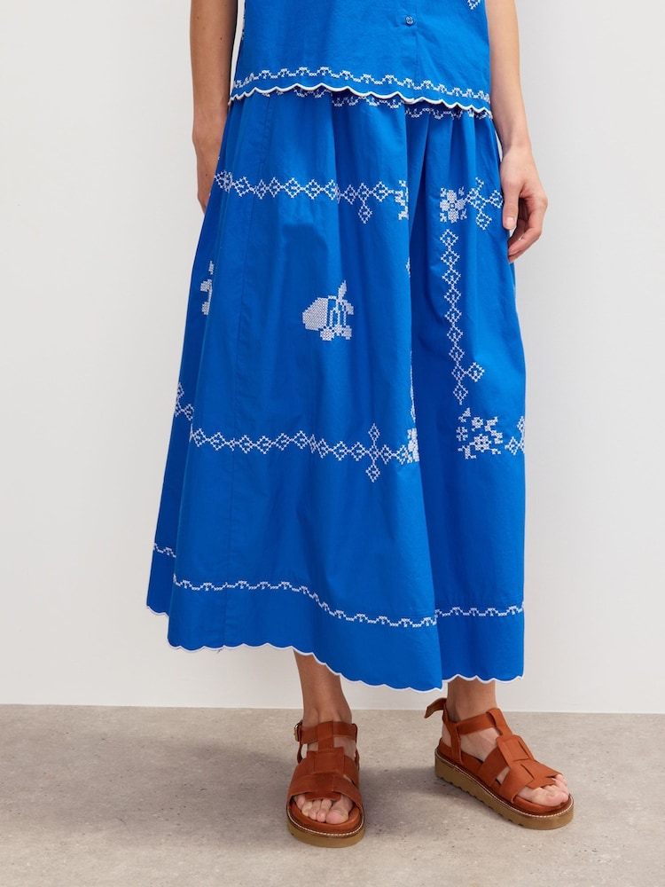 Oliver Bonas Blue Cross Stitch Midi Skirt - Image 1 of 7 Oliver Bonas Blue Cross Stitch Midi Skirt - Image 1 of 7