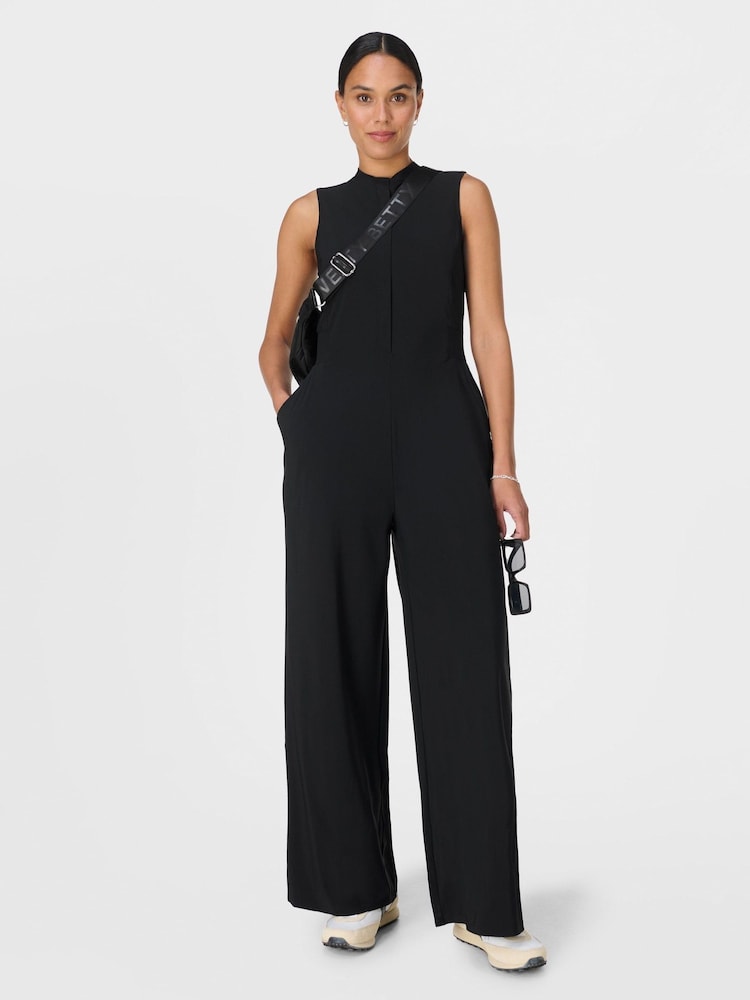 Sweaty Betty Black 32 inch inside seam Explorer Wide Leg 30" Jumpsuit - Image 1 of 7 Sweaty Betty Black 32 inch inside seam Explorer Wide Leg 30" Jumpsuit - Image 1 of 7