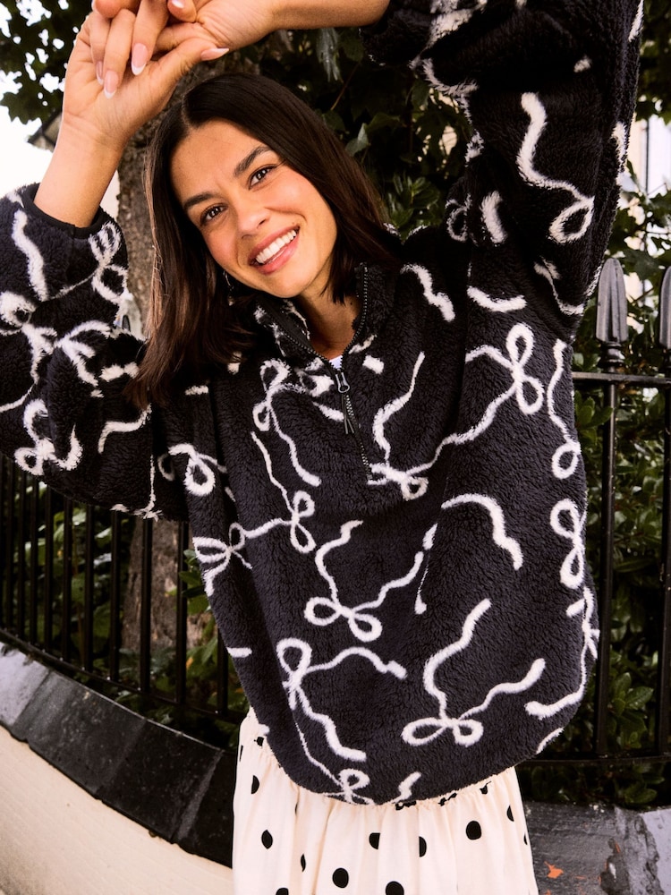 Skinnydip Black Bow Longline Fleece - Image 1 of 3 Skinnydip Black Bow Longline Fleece - Image 1 of 3