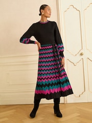 Vestido de punto a media pierna festoneado de Love & Roses - Imagen 4 de 4