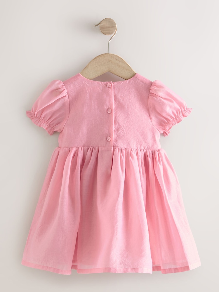 وردي - فستان كورساج بتصميم ورود للبنات (للأعمار من 3 أشهر إلى 8 سنوات) - صورة 2 من 4 وردي - فستان كورساج بتصميم ورود للبنات (للأعمار من 3 أشهر إلى 8 سنوات) - صورة 2 من 4