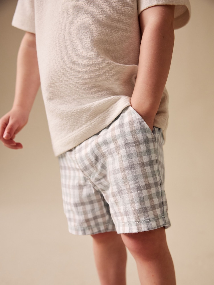 Pastel Gingham - شورت تشينو من مزيج الكتان (3 أشهر - 7 سنوات) - صورة 1 من 4 Pastel Gingham - شورت تشينو من مزيج الكتان (3 أشهر - 7 سنوات) - صورة 1 من 4
