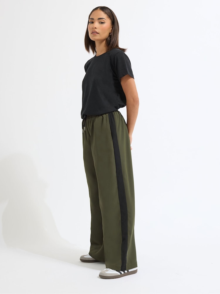PixieGirl Petite Green Side Stripe Wide Leg Trousers - Image 1 of 5 PixieGirl Petite Green Side Stripe Wide Leg Trousers - Image 1 of 5