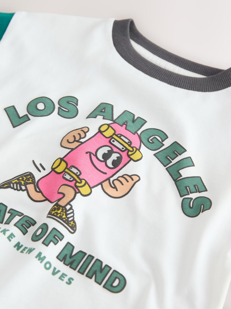 White/Pink/Green Skateboard - تيشرت بكُم قصير مزين برسمة جرافيك (3 شهور-7 سنوات) - صورة 4 من 4 White/Pink/Green Skateboard - تيشرت بكُم قصير مزين برسمة جرافيك (3 شهور-7 سنوات) - صورة 4 من 4