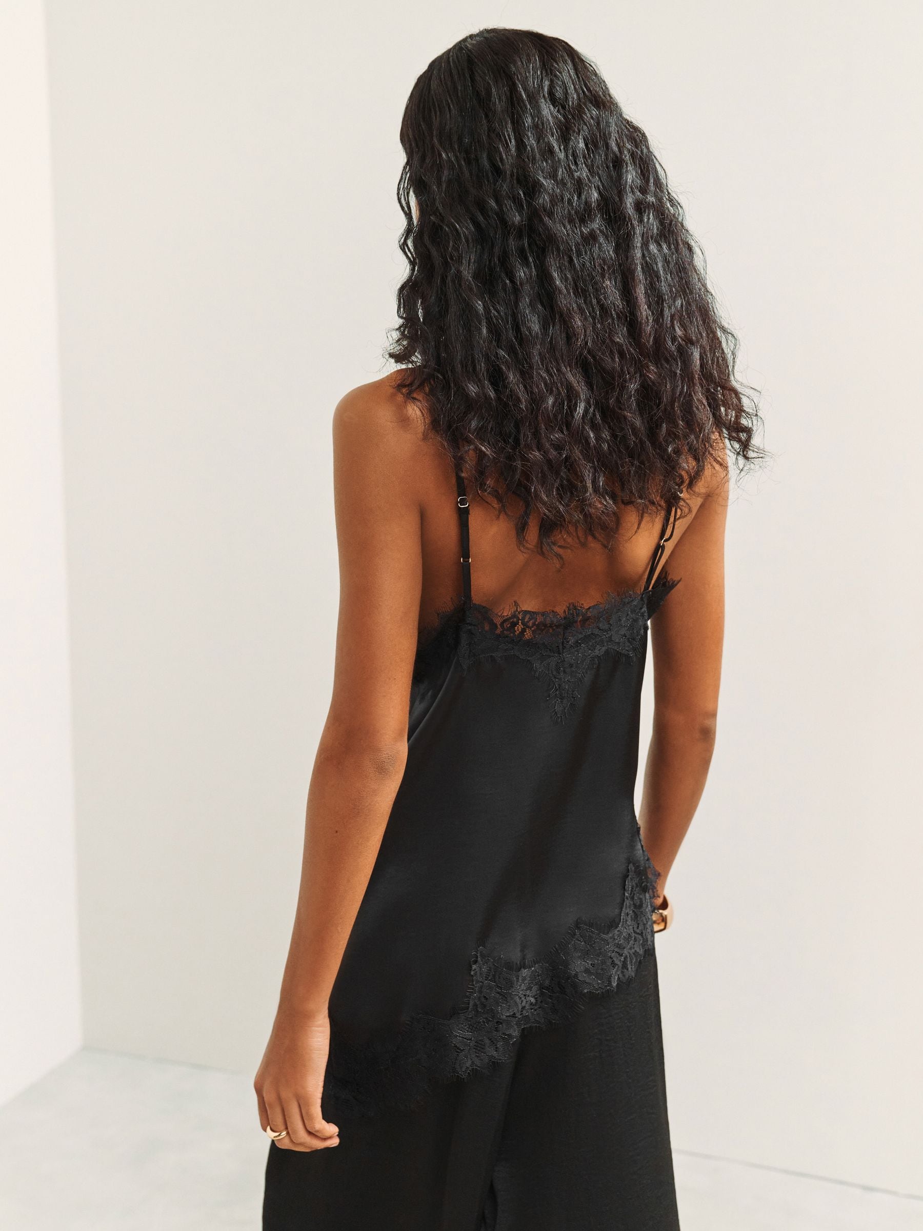 Buy Black Asymmetric Hem Lace Cami Top from Next USA