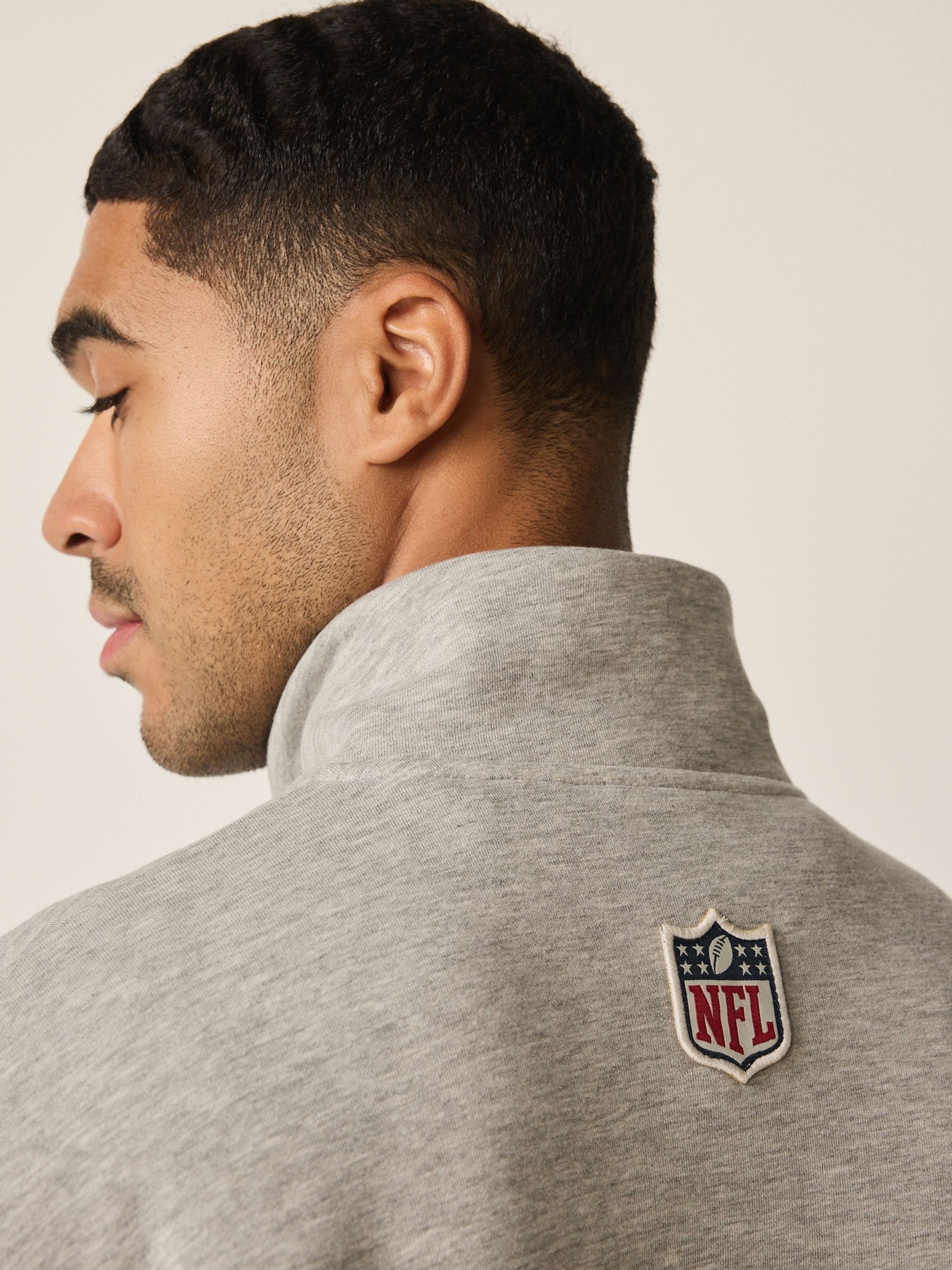 Buy Grey Marl NFL Graphic Quarter Zip Sweatshirt from Next USA
