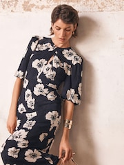 Vestido a media pierna con estampado de flores de Mint Velvet - Imagen 6 de 6